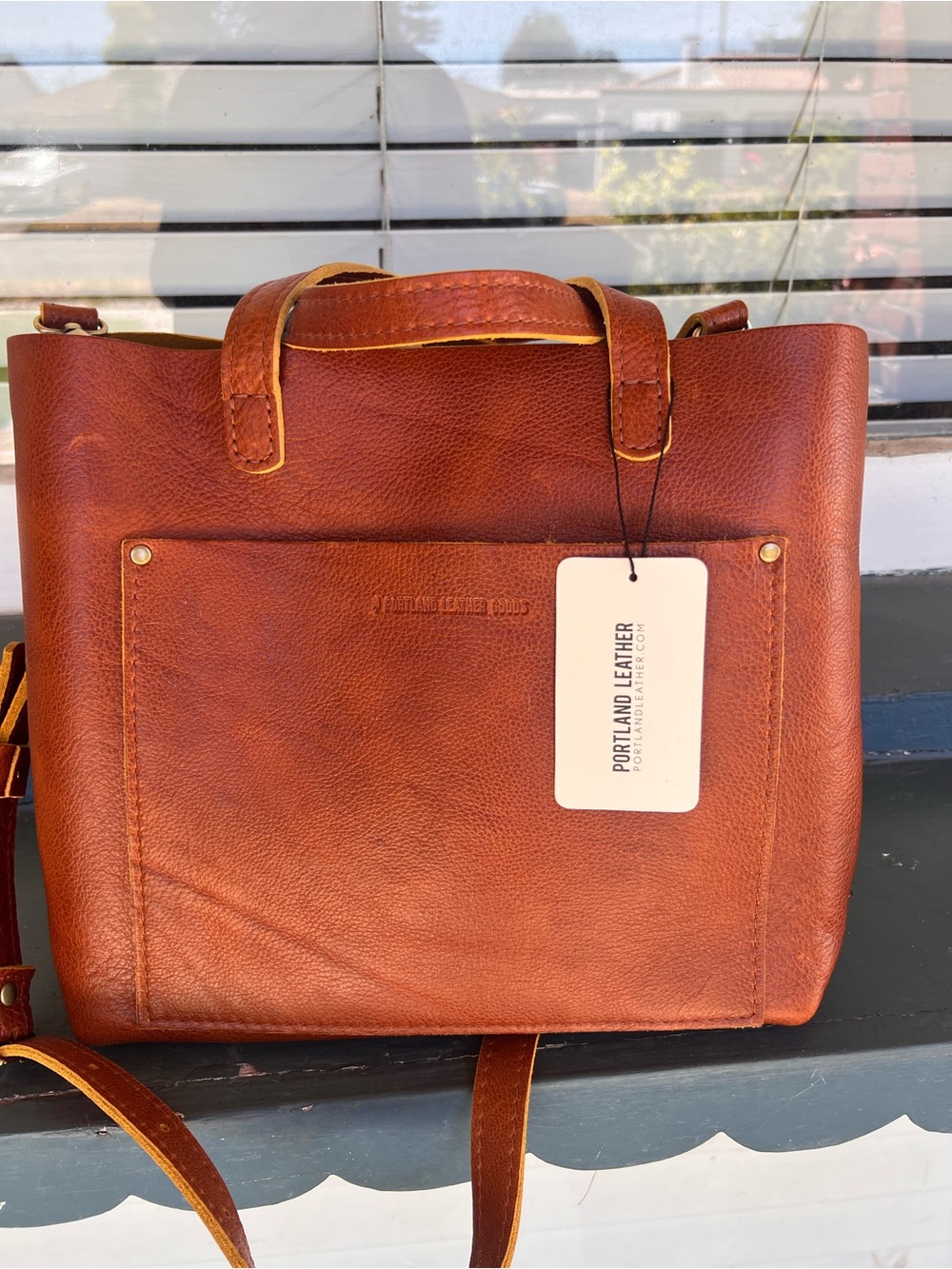 Portland Leather medium crossbody AP tote in Sienna